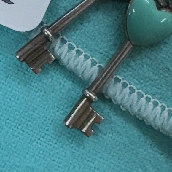 Tiffany & Co. Silver Necklace with Pink and Blue enamel keys. Mini size .